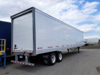NEW 2023 GREAT DANE CHAMPION SE 48' and 53' LOGISTIC ROLL UP DOOR TANDEM AXLE VAN TRAILERS 1